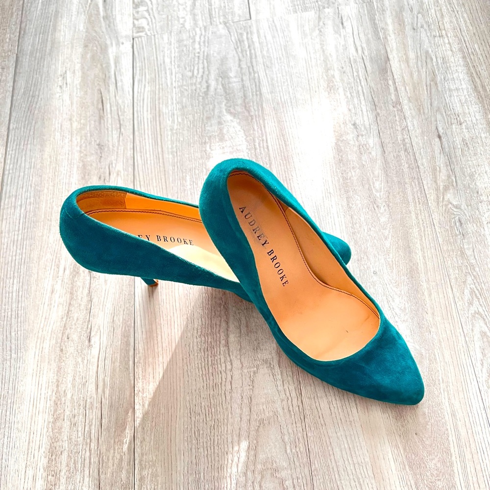Turquoise high heels.